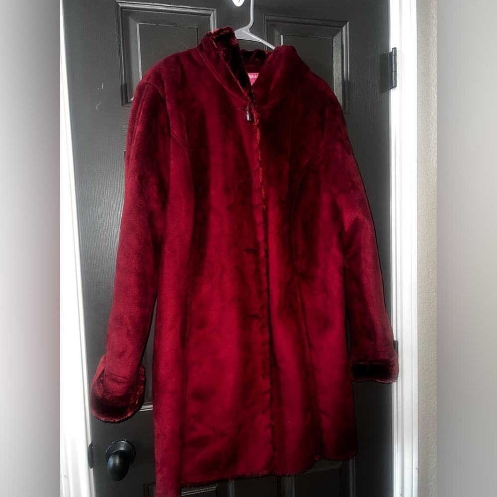 Woman within faux suede and fur coat 1X